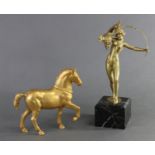 A gilt-bronze model of a horse with raised right fore-leg, after the antique, 6¼” high x 6½” wide; &