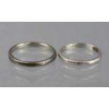 A Palladium narrow band, size: N; weight: 1.8gm; & a similar white metal band, possibly platinum,