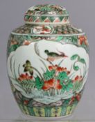 A Chinese porcelain ginger jar & cover painted with exotic birds & flowers in famille verte enamels;