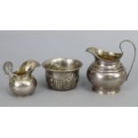 A Victorian silver squat round cream jug with loop handle, 3¾” high, Birmingham 1891, by Stokes &