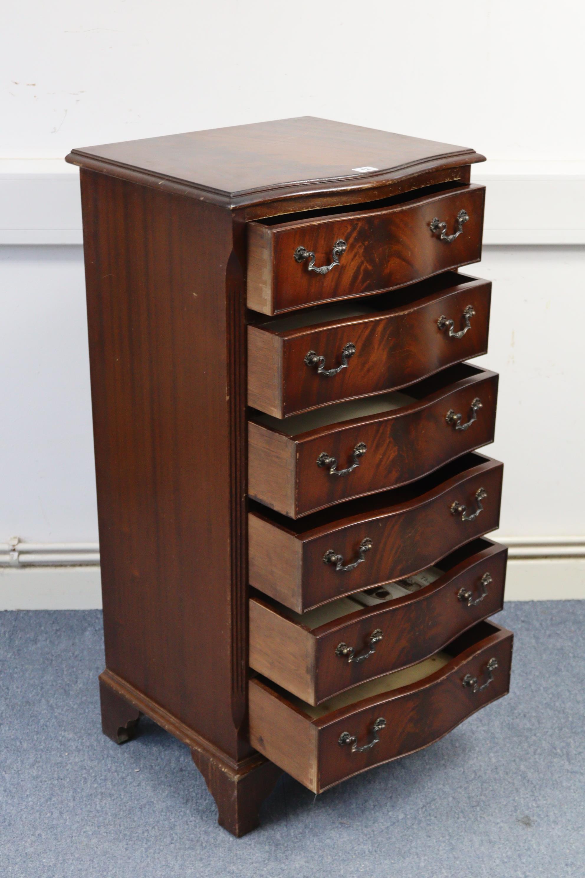 A reproduction mahogany small upright serpentine-front chest, fitted six long drawers with cast- - Image 2 of 3