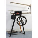 A Hobbies “The Gem” cast-iron treadle fret-saw on black & gold painted frame, 28” wide x 34¼” high x