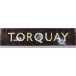 AN EARLY-MID 20th CENTURY LARGE BROWN & WHITE ENAMELLED RECTANGULAR RAILWAY STATION SIGN; “