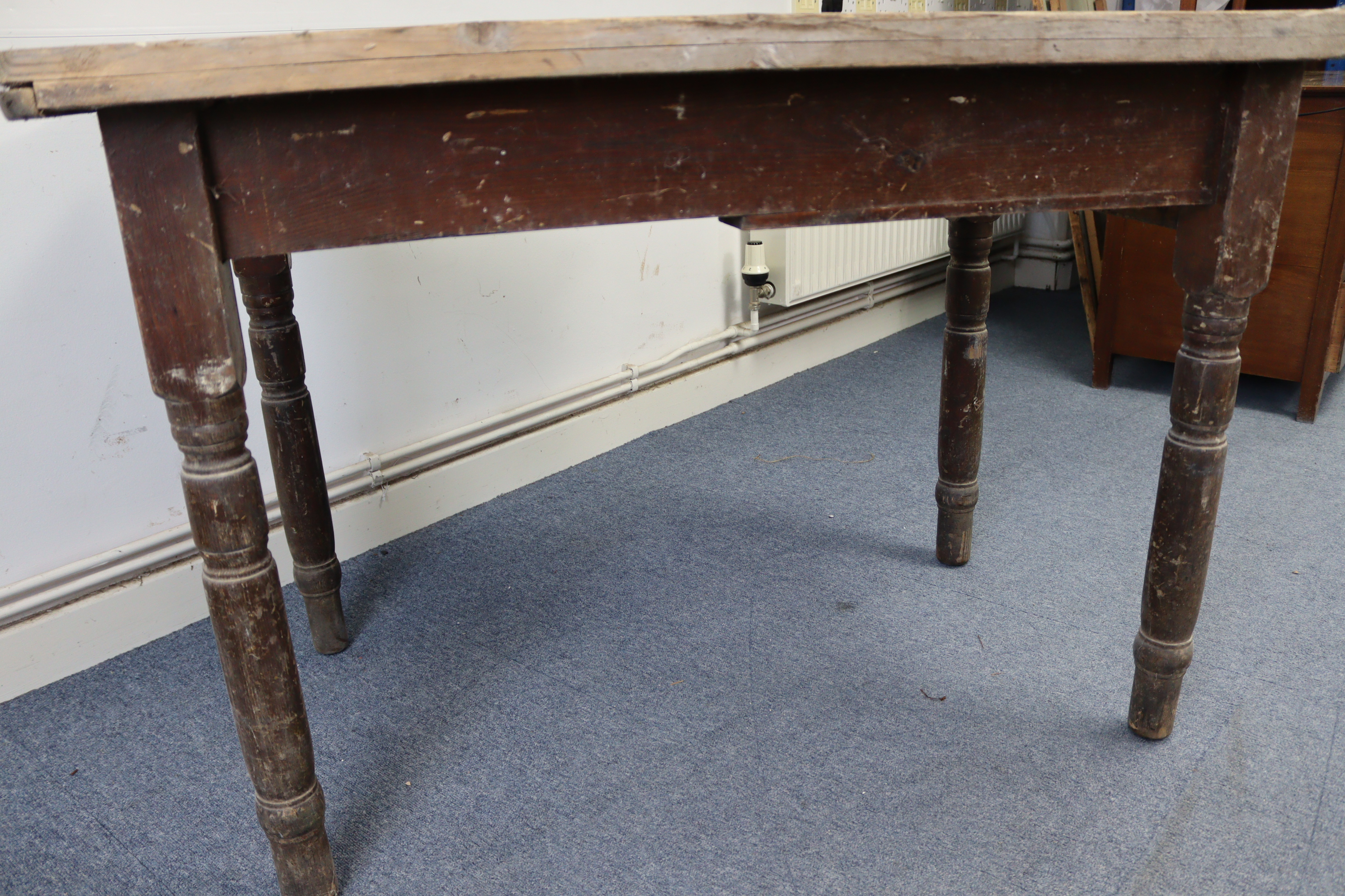 A pine kitchen side table, fitted end drawer & on four turned tapered legs, 25½” x 41½”. - Image 5 of 5