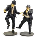 A PAIR OF LIFE-SIZE FIGURES DEPICTING THE BLUES BROTHERS, PAINTED FIBREGLASS, 76” & 67” high,