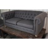 Another modern Chesterfield sofa upholstered buttoned blue material, on turned legs with brass