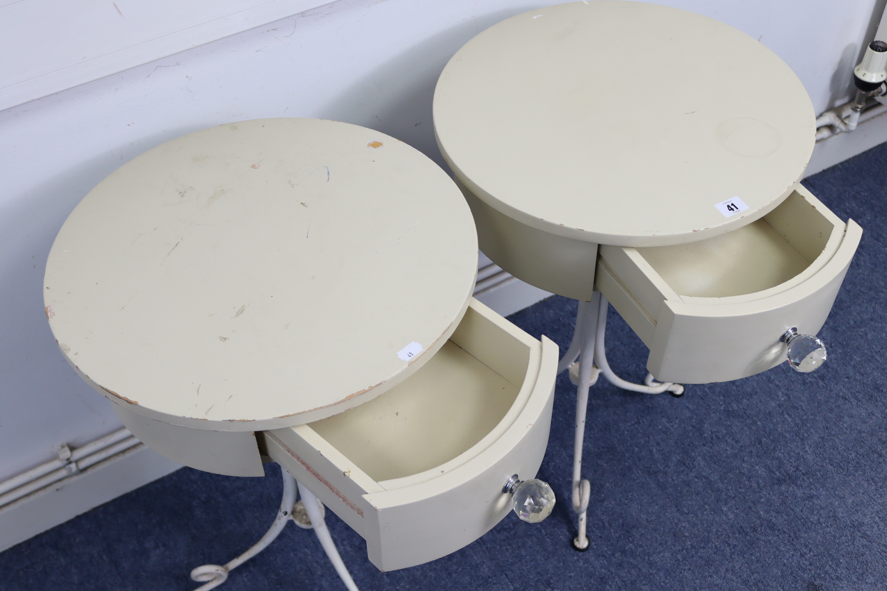 A pair of cream finish bedside tables, each with circular top, fitted frieze drawer, & on white - Image 2 of 2