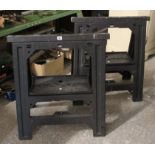 A pair of Stanley black plastic trestle-table supports.