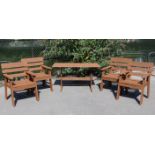 A Hattersley of Keighley teak garden table with rectangular top, & on square end supports joined