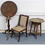 A 19th century oak tripod table with circular top, & on vase-turned centre column & three cabriole