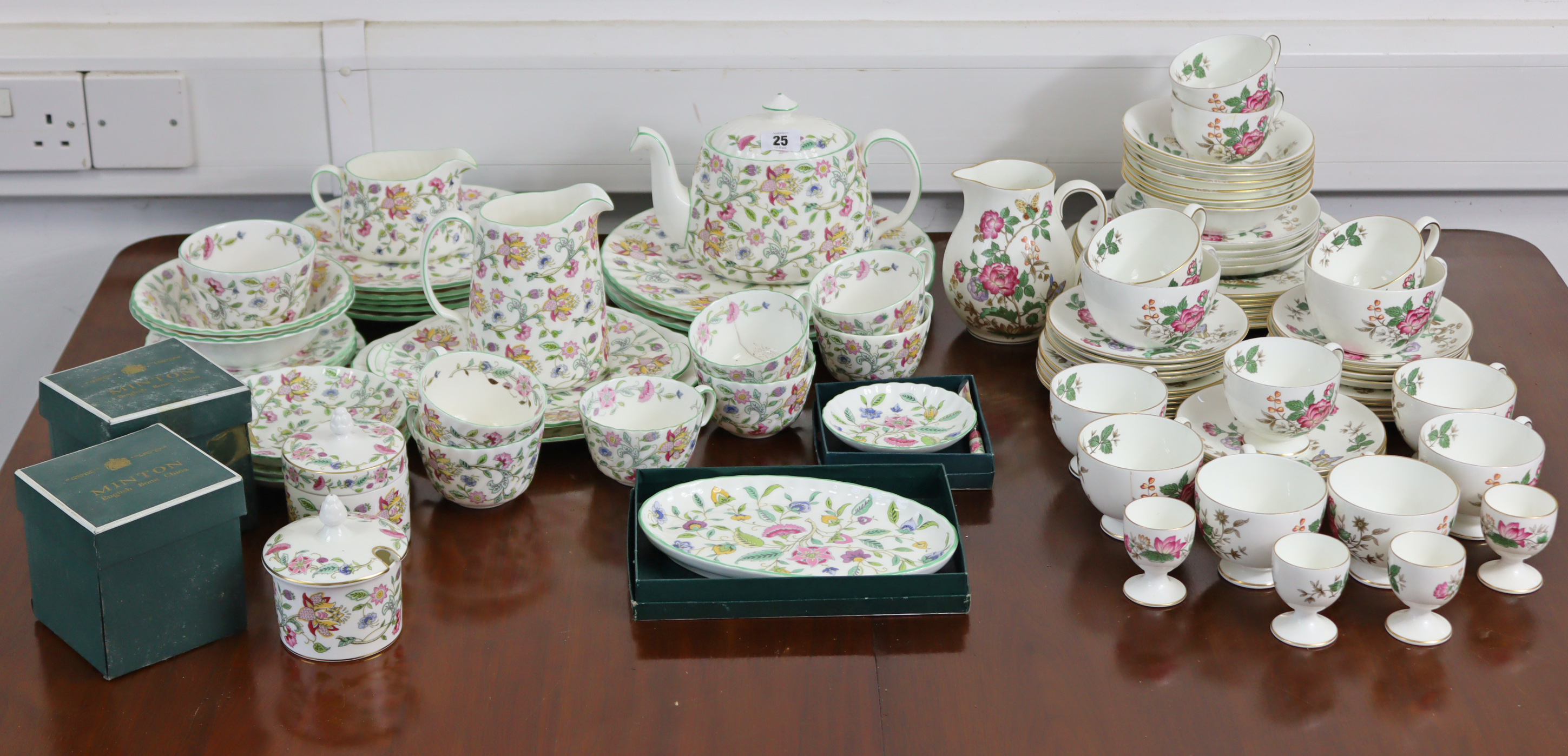 Fifty-nine items of Wedgwood “Charnwood” pattern teaware; & thirty items of Mintons “Haddon Hall”