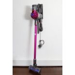 A Dyson “V7 Motorhead +” cordless vacuum cleaner with accessories & charger, w.o.