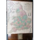 A 19th century Mogg’s hand-coloured linen-backed map of “England And Wales with part of Scotland”,