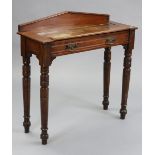 A late Victorian mahogany side table with triangular low-stage panel back, with hinged compartment