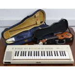 A Yamaha “Automatic Bass Chord System” electric keyboard, w.o.; together with a Stentor “Student II”