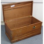 A mahogany storage trunk with hinged lift lid & on block feet, 33½” wide x 16¼” high.