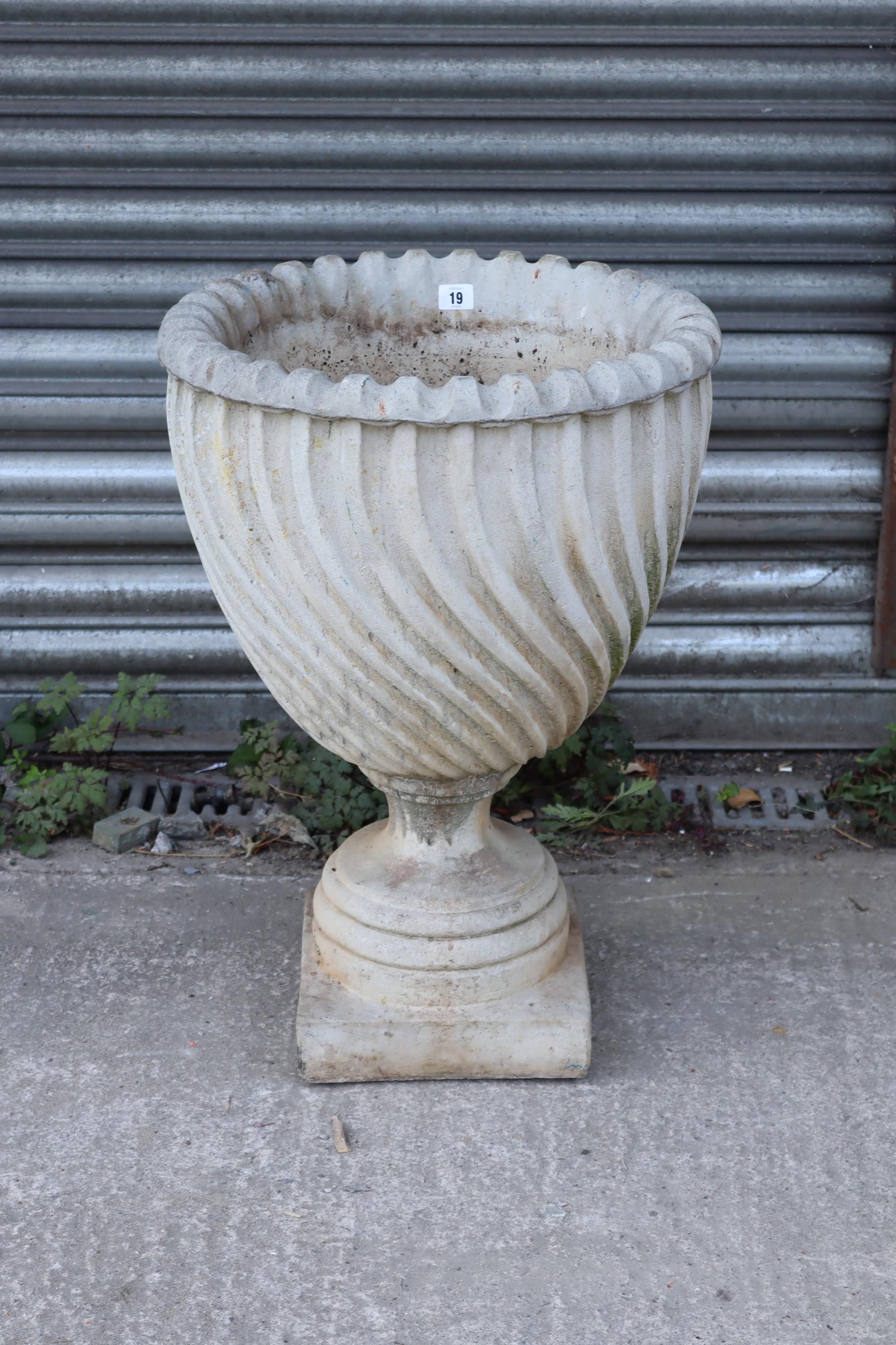 A reconstituted-stone garden urn of spiral-fluted design, & on square pedestal foot, 18” diam x - Image 2 of 3