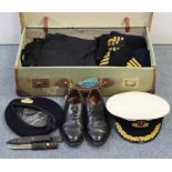 A Royal Navy officer’s peaked cap; a Royal Navy issue diver’s knife with sheath; & various other