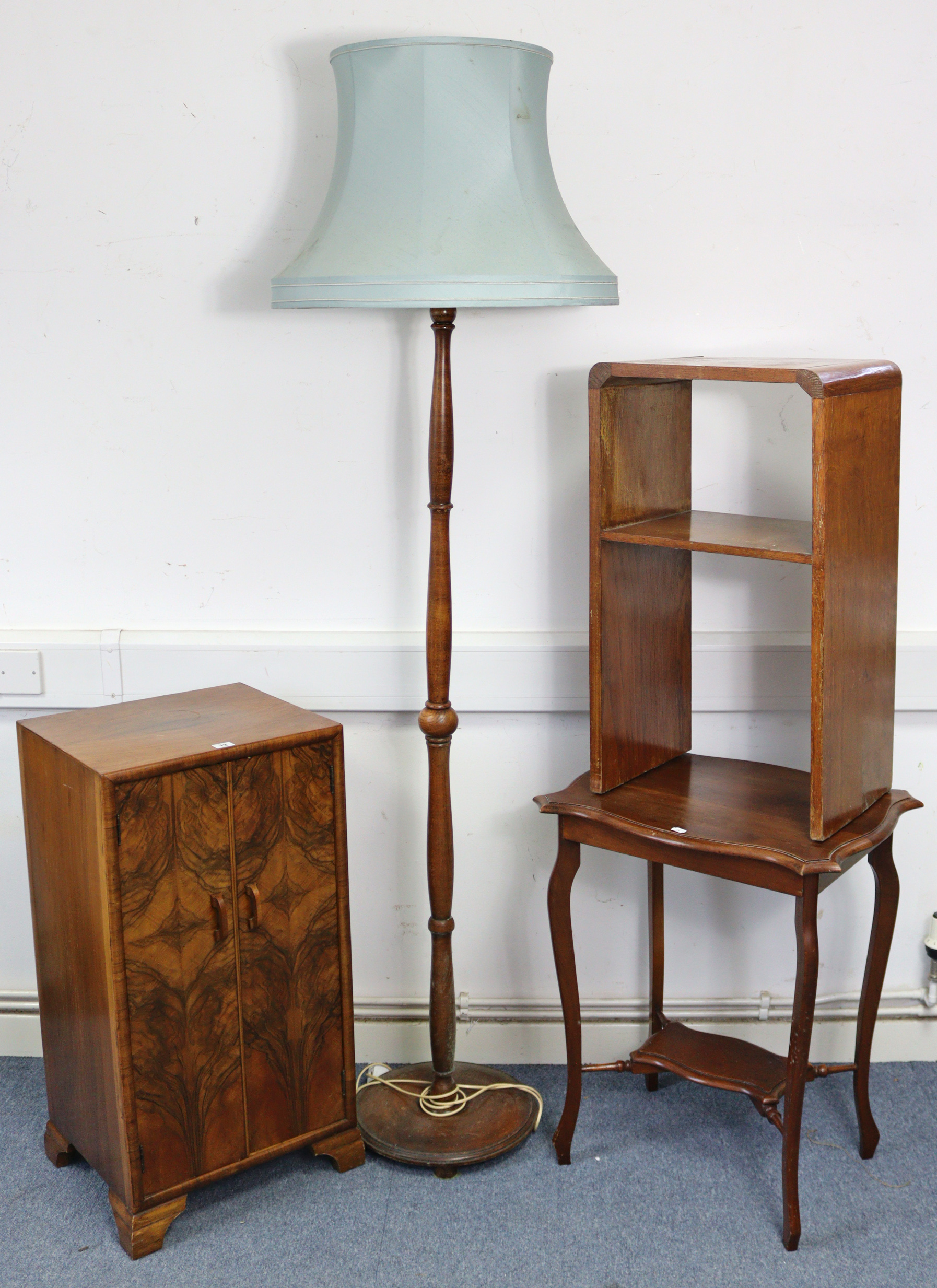 A mid-20th century walnut sheet-music cabinet, fitted six shelves enclosed by pair of panel doors, &