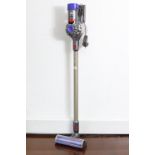 A Dyson “V8 Animal” cordless vacuum cleaner, with charger, w.o.