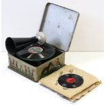 A Bavarian “Bing Pigmyphone” child’s record player complete with horn & seven records.