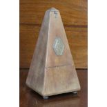 A Maezel (French) metronome in mahogany case, 9” high.