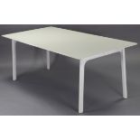 A white-finish dining table with rectangular top & on four square chamfered legs, 76¾” x 38¼”.