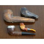 A Thomson’s of Dunfermline briar pipe; & a Meerschaum pipe, each with silver mount, & with Morocco