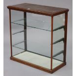 An early 20th century mahogany retailer’s counter-top display cabinet, fitted two plate-glass