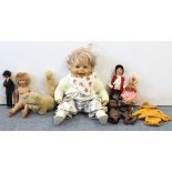Six various dolls; & a cat soft toy.