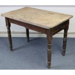 A pine kitchen side table, fitted end drawer & on four turned tapered legs, 25½” x 41½”.