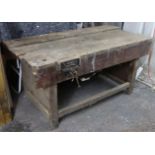 A wooden carpenter’s work bench on square legs with plain stretchers, & fitted with a Record No.