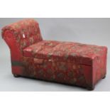 A small ottoman day-bed with scroll end & hinged lift-seat, upholstered brass-studded & multi-