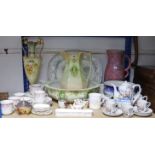 A late Victorian floral decorated toilet jug & basin; a late Victorian floral decorated oval two-