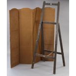 A hardwood studio easel, 76” high; & a hessian-covered four-fold draught screen, 67” high.