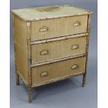 A bamboo & woven-cane small chest, fitted three long drawers with brass cup handles, 29¾” wide x