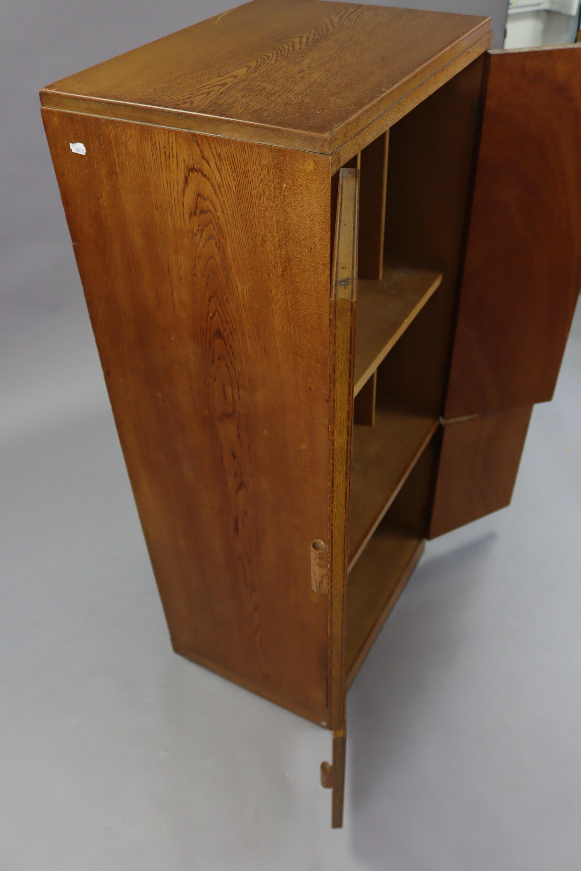 A mid-20th century oak upright cupboard, enclosed by two pairs of panel doors, & on plinth base, 22” - Image 3 of 3