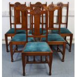 A set of six 1930’s carved walnut rail-back dining chairs with padded drop-in seats & on square