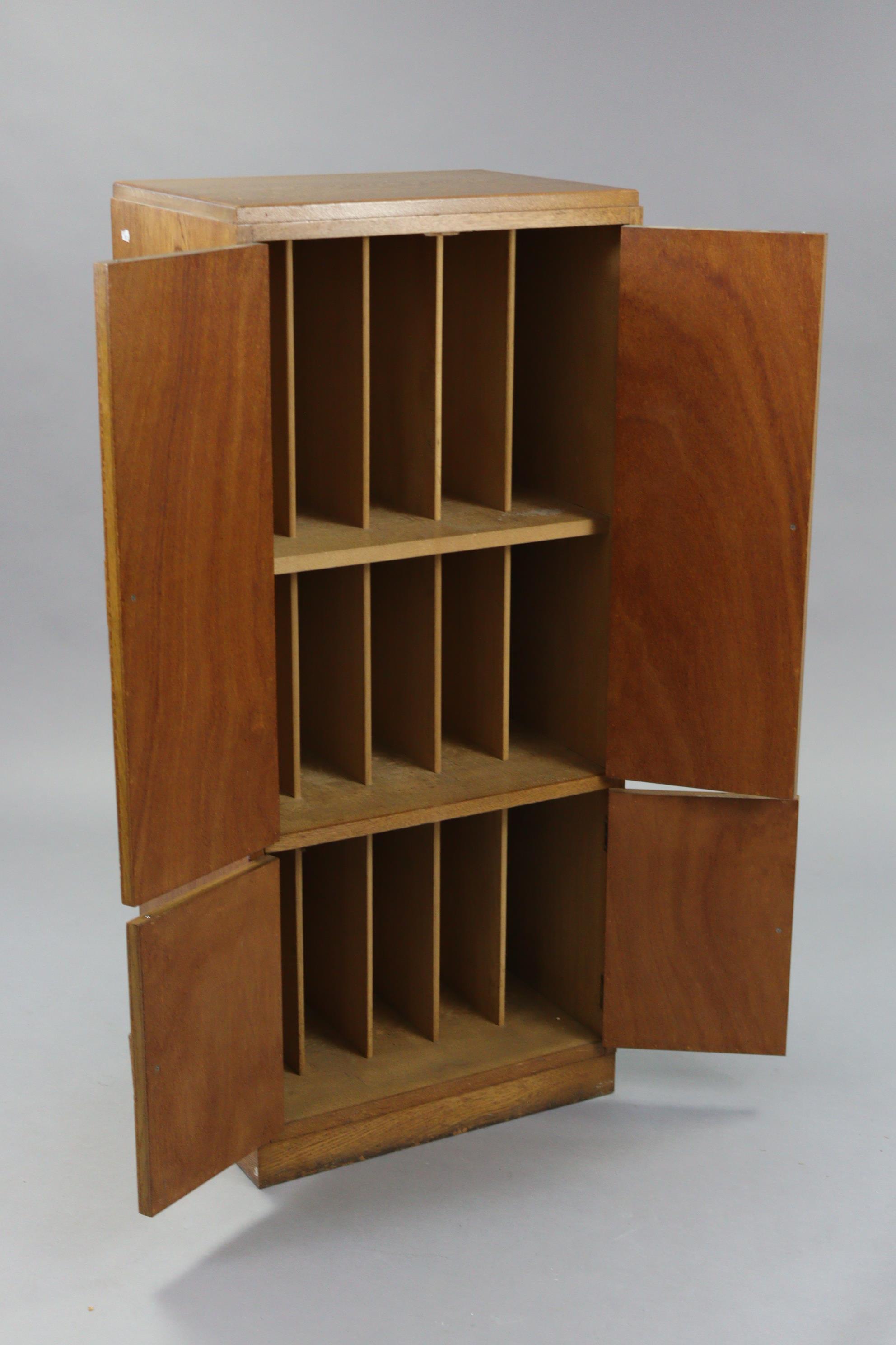 A mid-20th century oak upright cupboard, enclosed by two pairs of panel doors, & on plinth base, 22” - Image 2 of 3