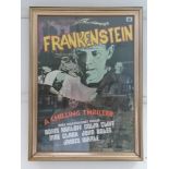 A reproduction movie poster “Frankenstein”, 27” x 19¼”, in glazed gilt frame.