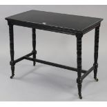 A late Victorian ebonised rectangular side table, on ring-turned legs with ceramic castors, 36”