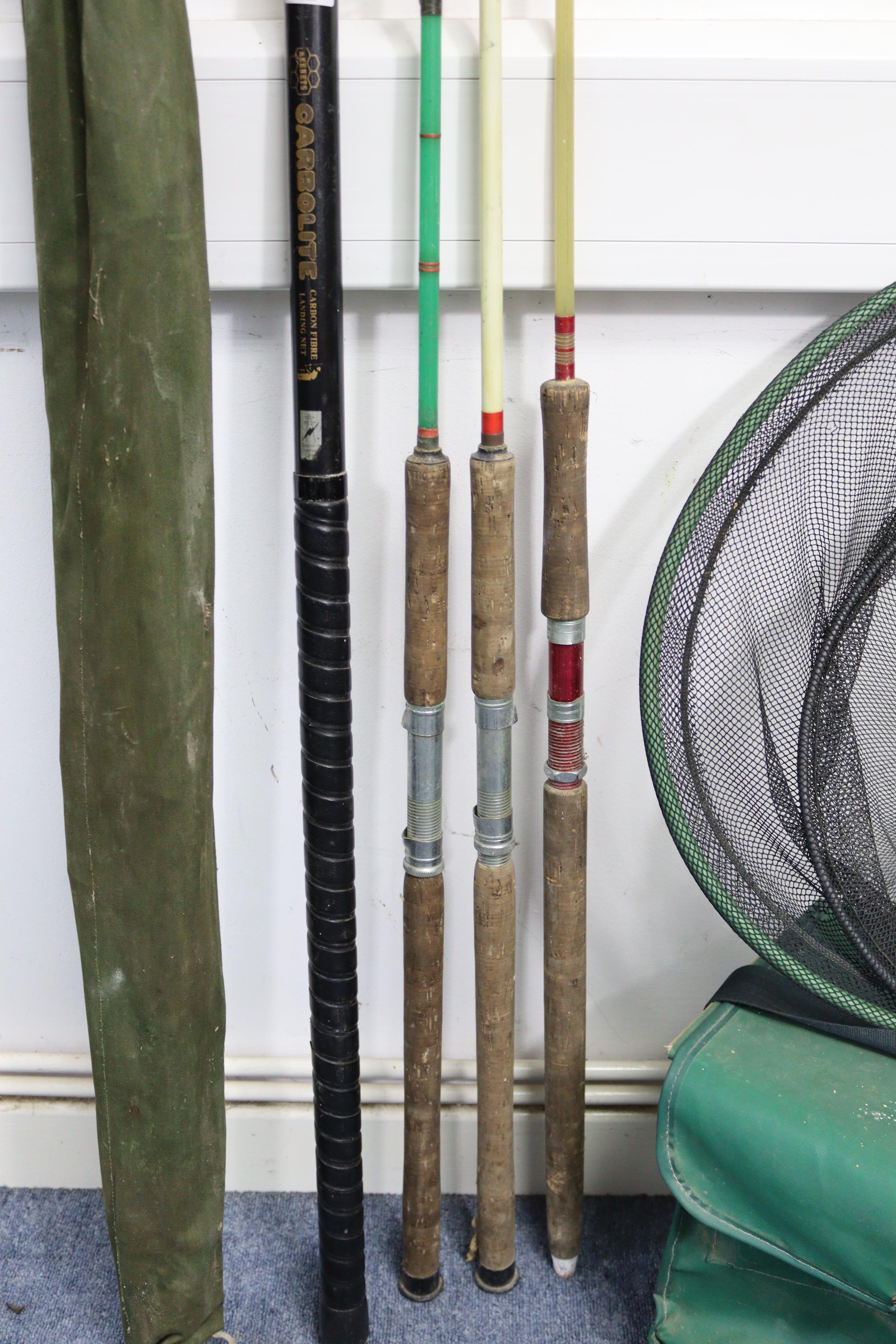 Five fishing rods; a landing net; & various other angler’s accessories.