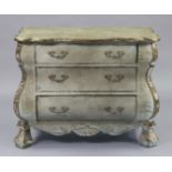 A similar low bombé chest, fitted three long graduated drawers with gilt-metal handles, & on lion-