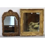 A gilt-gesso frame rectangular wall mirror, with raised scroll border, 29” x 26” (w.a.f.); & a