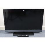 A Sony Bravia 32” LCD television with remote control, w.o.