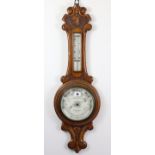 A late 19th/early 20th century aneroid wall barometer, the white enamel dial signed “Pastorelli &