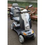 A Kymco “Foru” mobility scooter, with charger & key, w.o. *PLEASE NOTE: The scooter turns on, the li