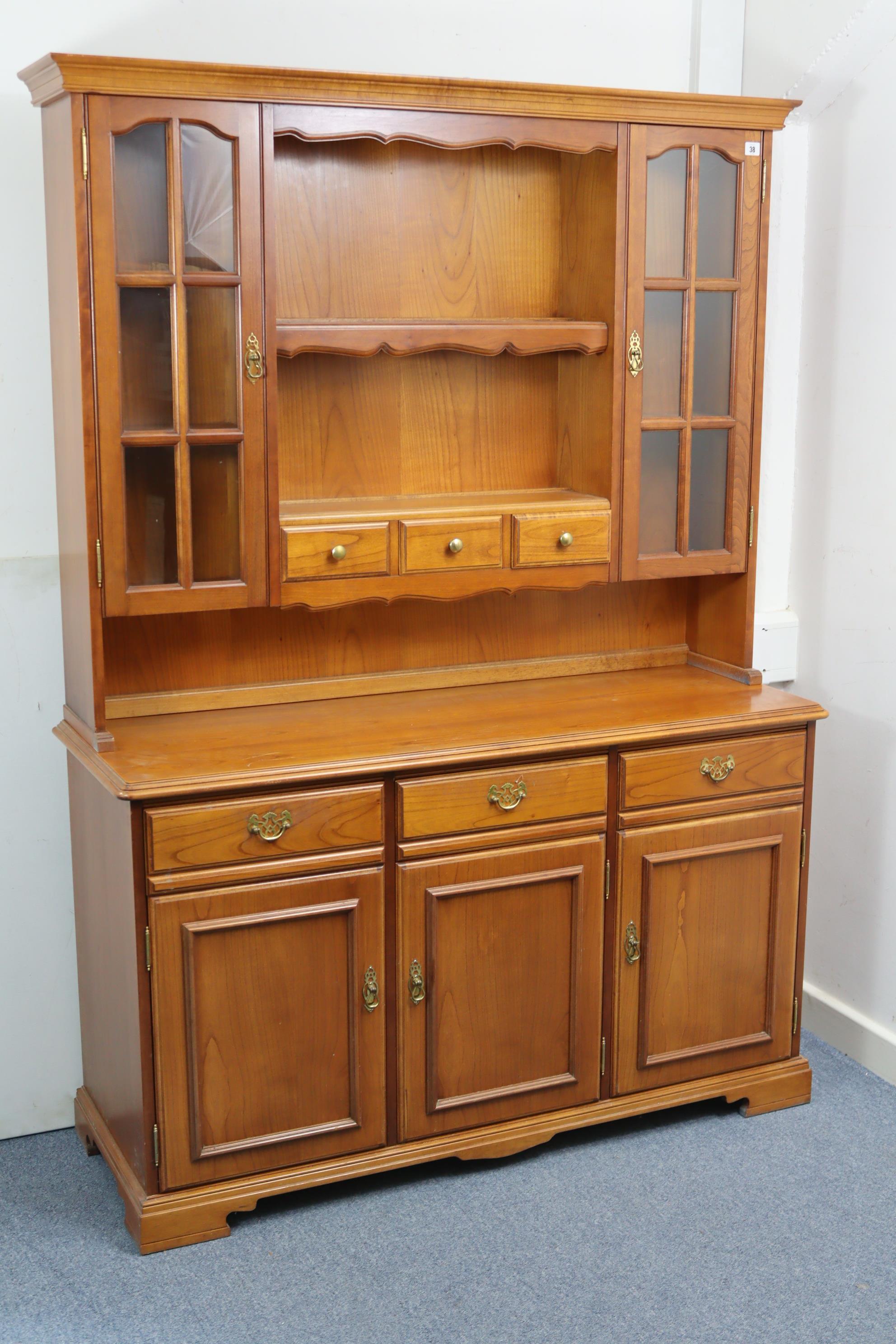 A Younger's cherrywood tall side unit, the upper part fitted open shelf to centre above three small