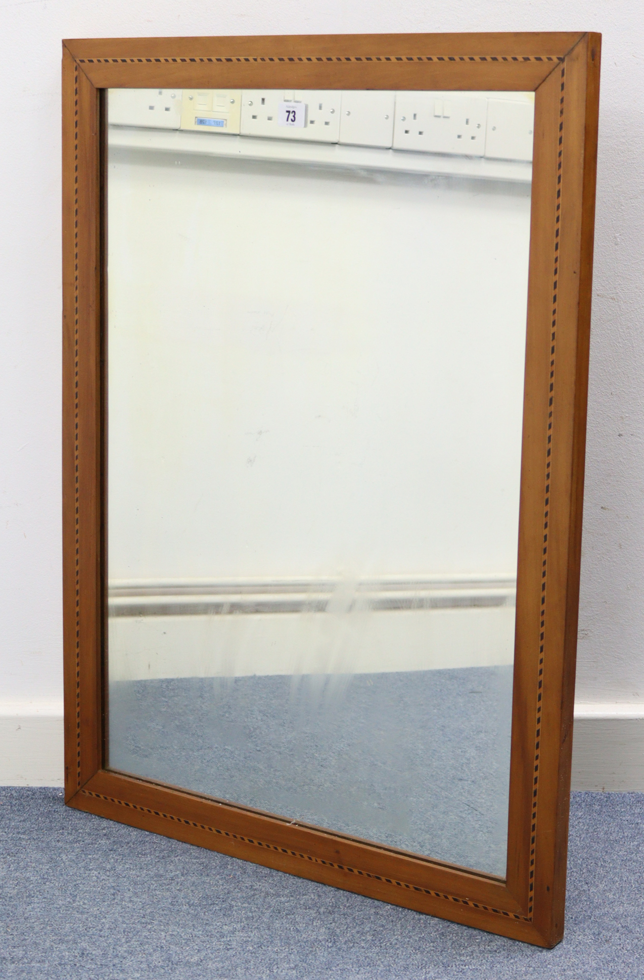 A 1930’s rectangular wall mirror in inlaid-mahogany frame, 31¾” x 23¼”.