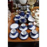A Denby pottery blue glazed thirty-seven piece part dinner, tea & coffee service; & a Royal Stafford
